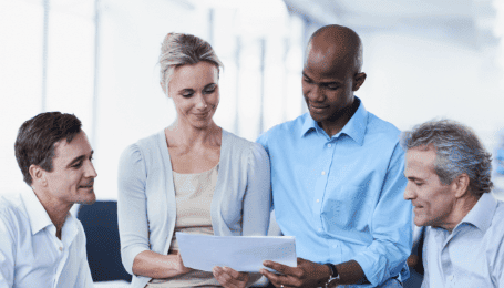 employees reading documents